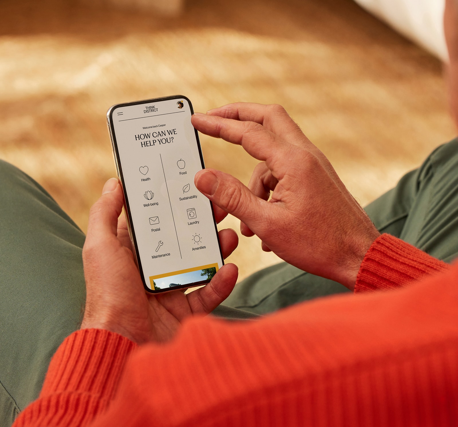 A person reserving some amenities through the Thick District app.