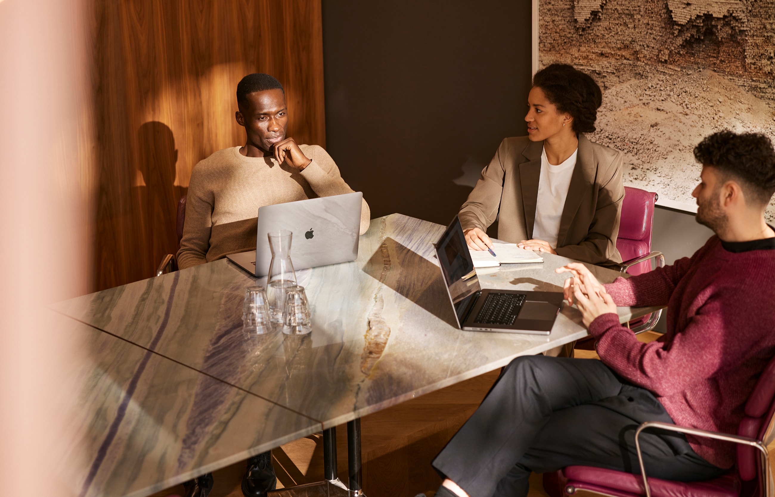 A group of people working in Think District.